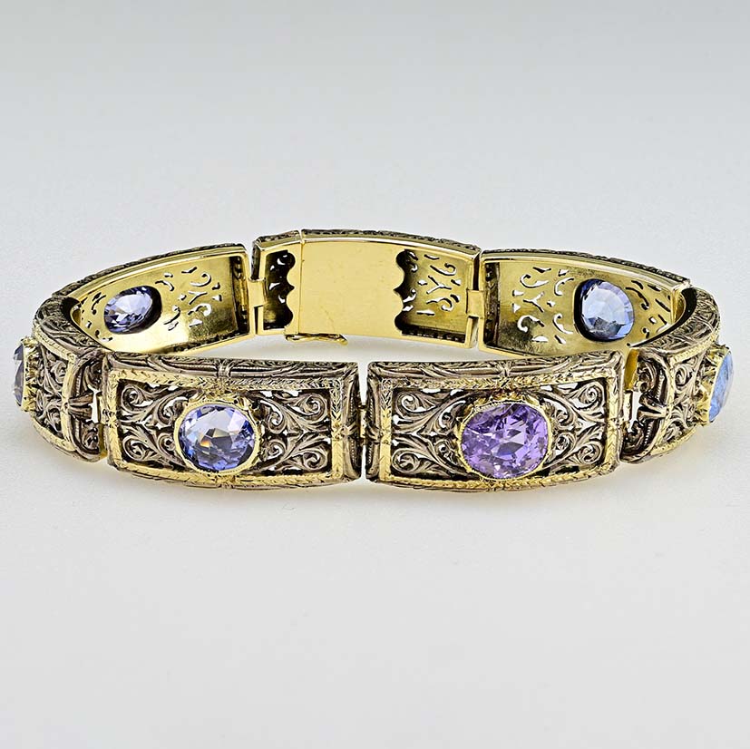 Vintage 19.45ct Natural No Heat Ceylon Sapphire Panel Link Bracelet, Ornate silver topped gold panels with seven natural unheated Ceylon sapphires, central sapphire is lovely fleur de lys Lavender purple colour. Circa 1935
