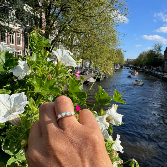 Diamond and Opal Four Stone Eternity Ring in Yellow gold
