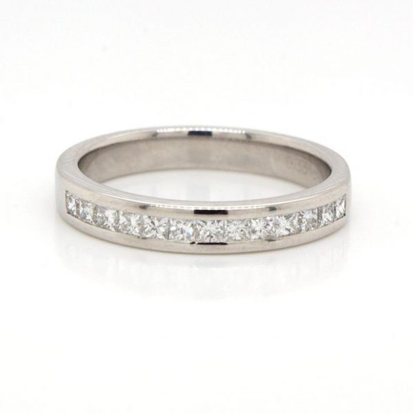 Princess Cut Diamond Half Eternity Ring; channel set with thirteen princess cut diamonds, 0.33 carat total, mounted in platinum