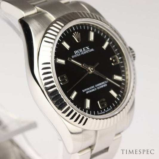 Rolex Oyster Perpetual Midsize 31mm Steel and White Gold Automatic Watch; Ref 177234, black dial, screw down crown and sapphire crystal, on a stainless steel Oyster bracelet, Circa 2006-2007