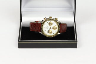 Omega Speedmaster Reduced 39mm Automatic Chronograph in Steel and Gold, white baton dial, yellow gold tachymetre bezel, on red/brown lizard strap with pin buckle.