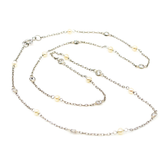 Art Deco Diamond, Pearl and Platinum "Station" Necklace, 0.80 Carat