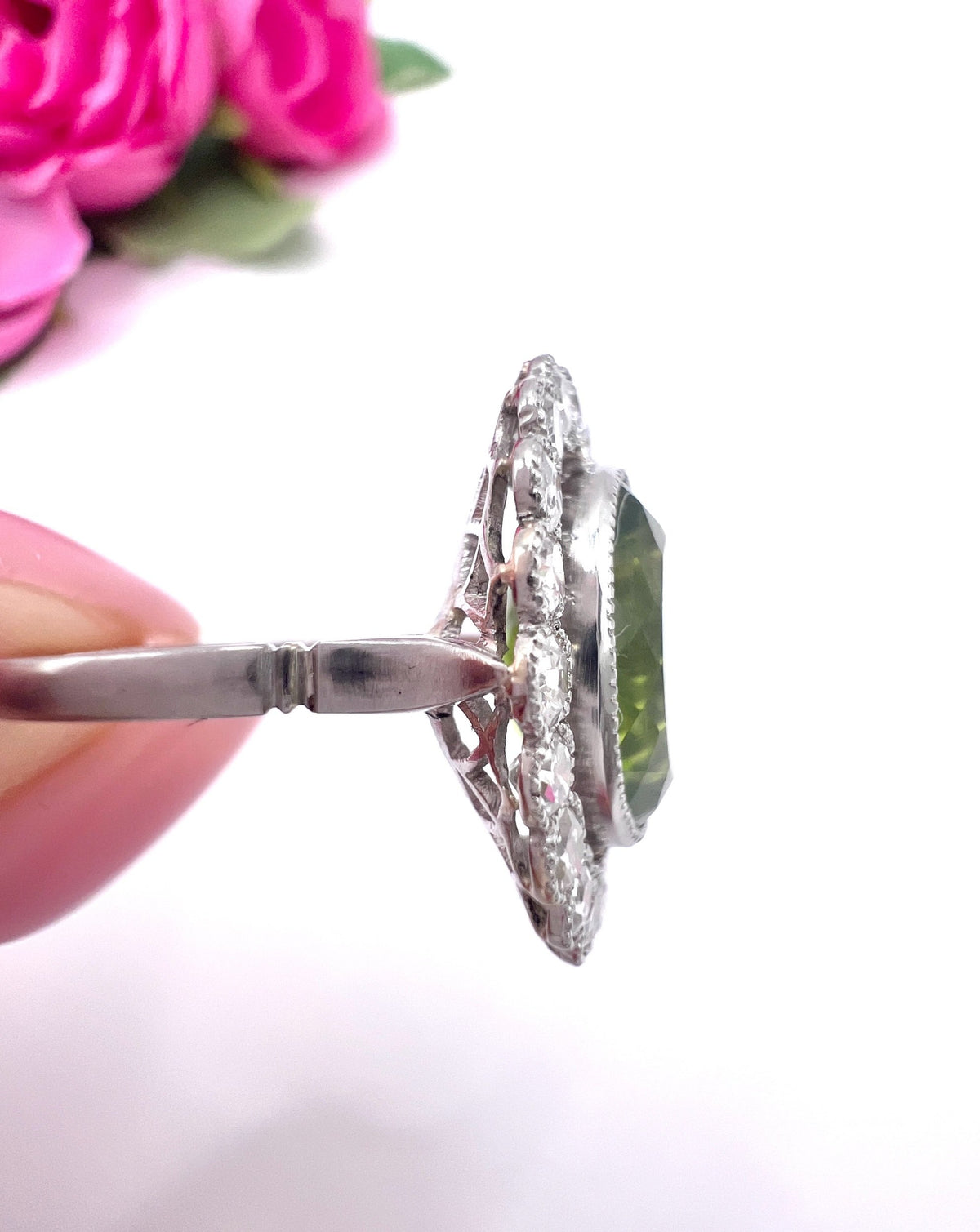 Antique French Platinum Peridot and Diamond Halo Cluster Ring, Circa 1910
