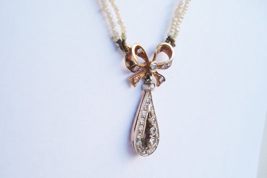 Antique Art Deco Diamond and Pearl Bow Pendant