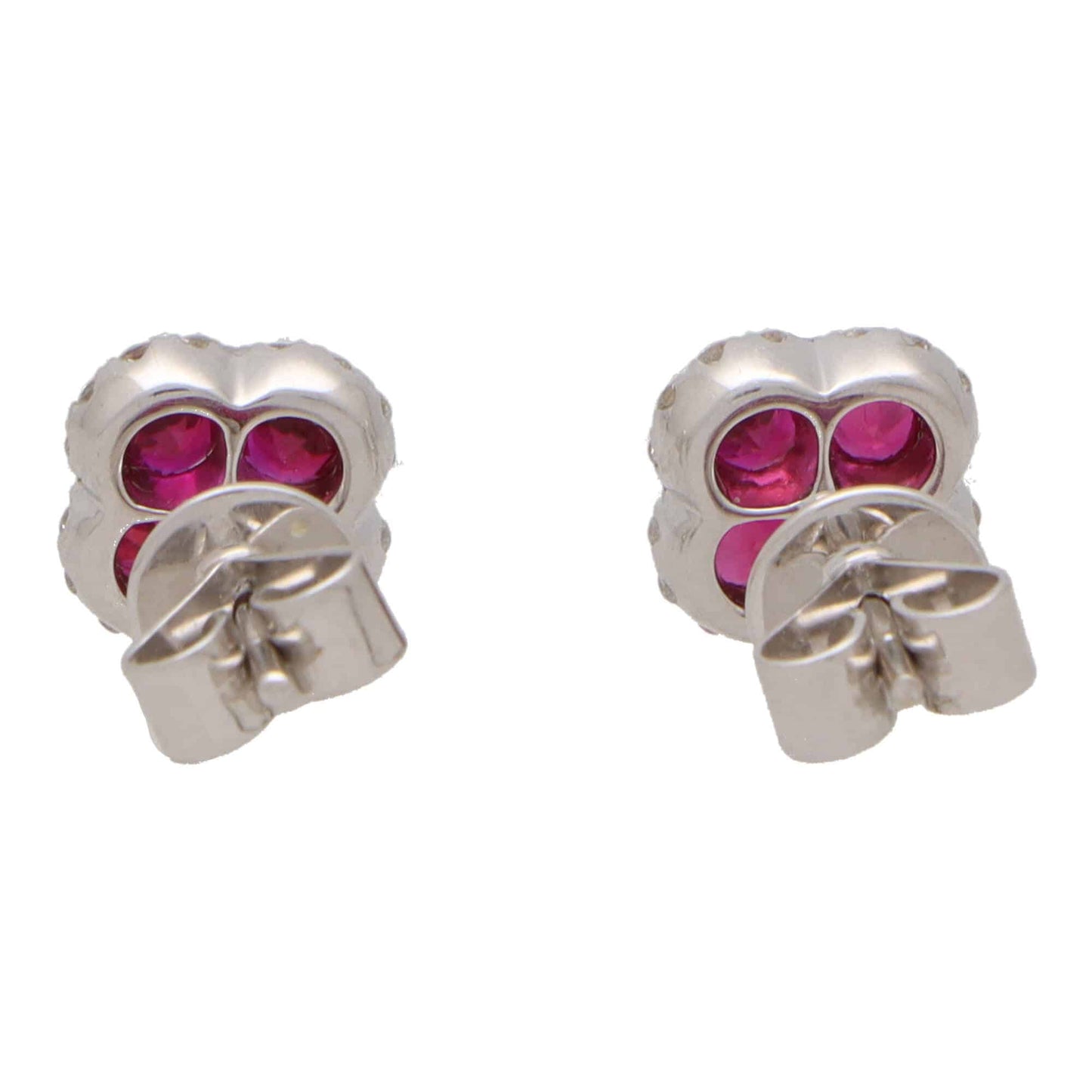 Ruby and diamond cluster earrings in white gold.