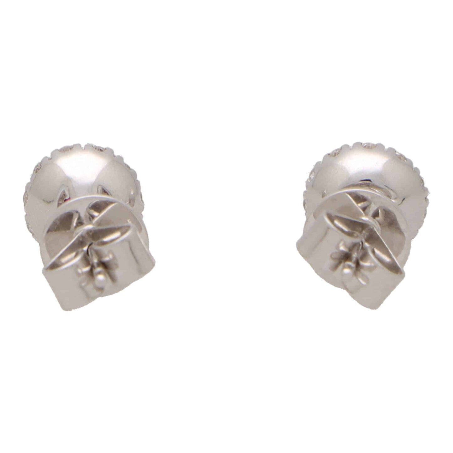 Ruby and diamond cluster earrings in white gold.