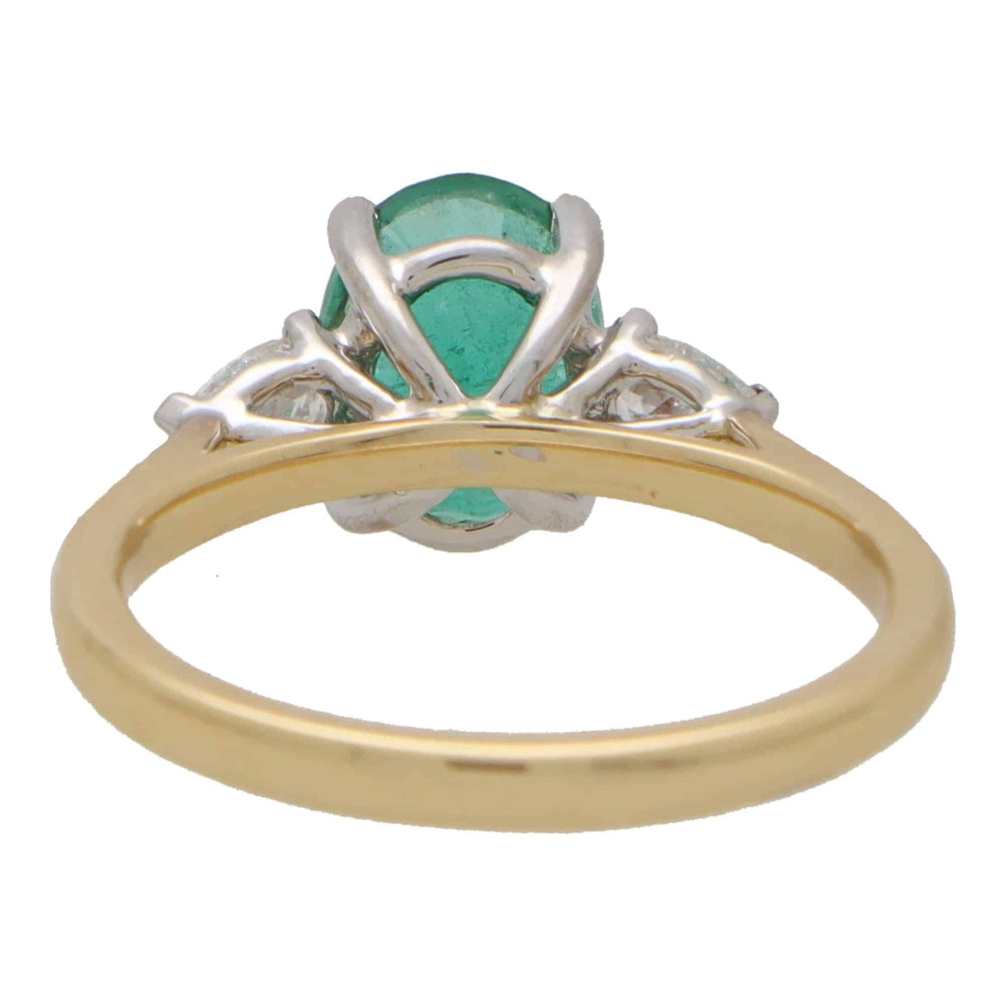 Emerald and Pear Cut Diamond Three Stone Engagement Ring