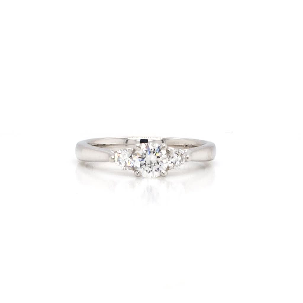A Platinum Three-Stone Diamond Ring, 0.40ct F, Si1