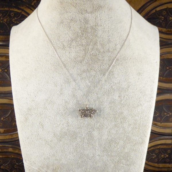 Antique Late Victorian Diamond and Ruby Pig on Platinum Chain