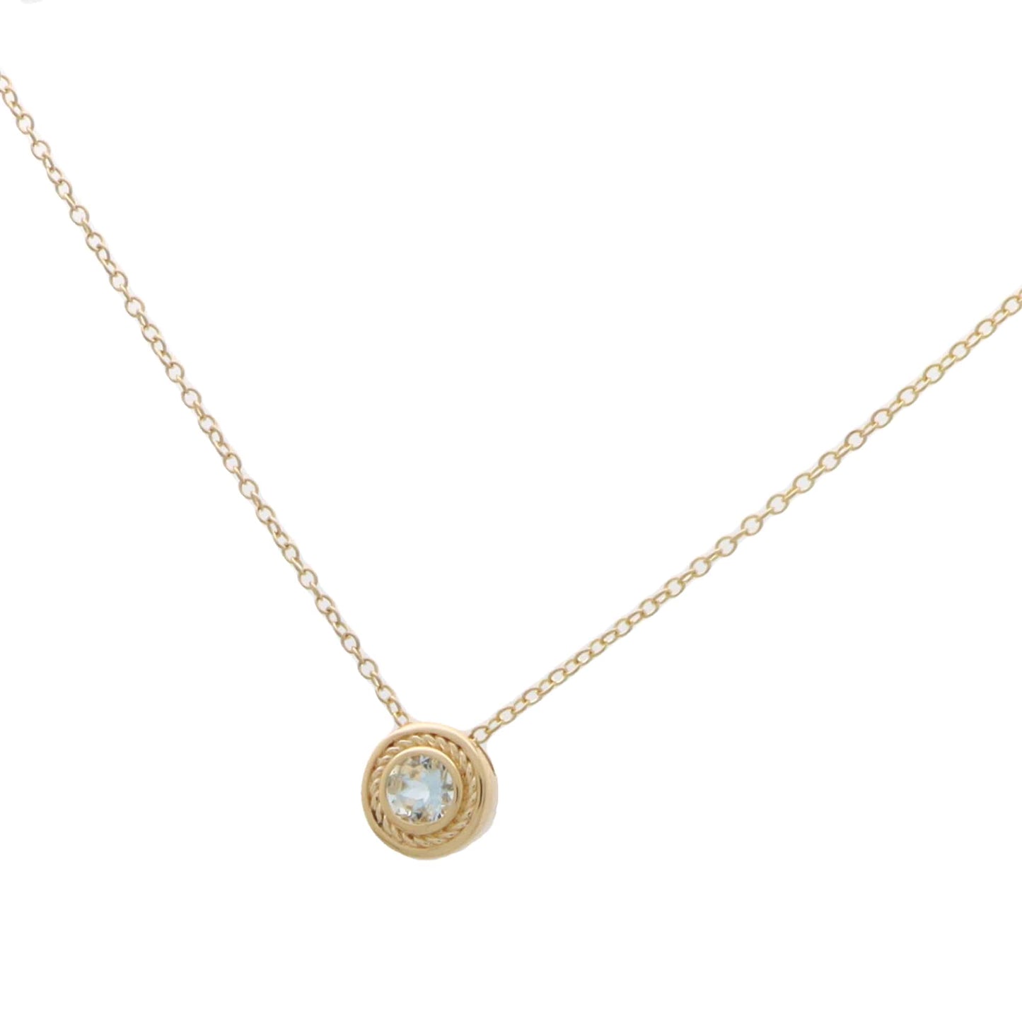 A yellow gold pendant necklace with a round aquamarine, on a white background