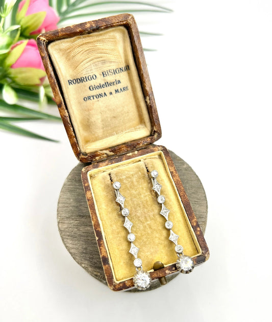 A pair of diamond drop earrings in yellow gold and platinum, in an antique box