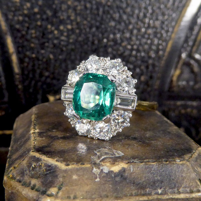 Contemporary 2.08ct Emerald and 1.25ct Diamond Cluster Ring