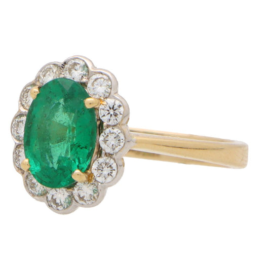 1.55ct Oval Emerald and Diamond Floral Cluster Ring in 18ct Gold
