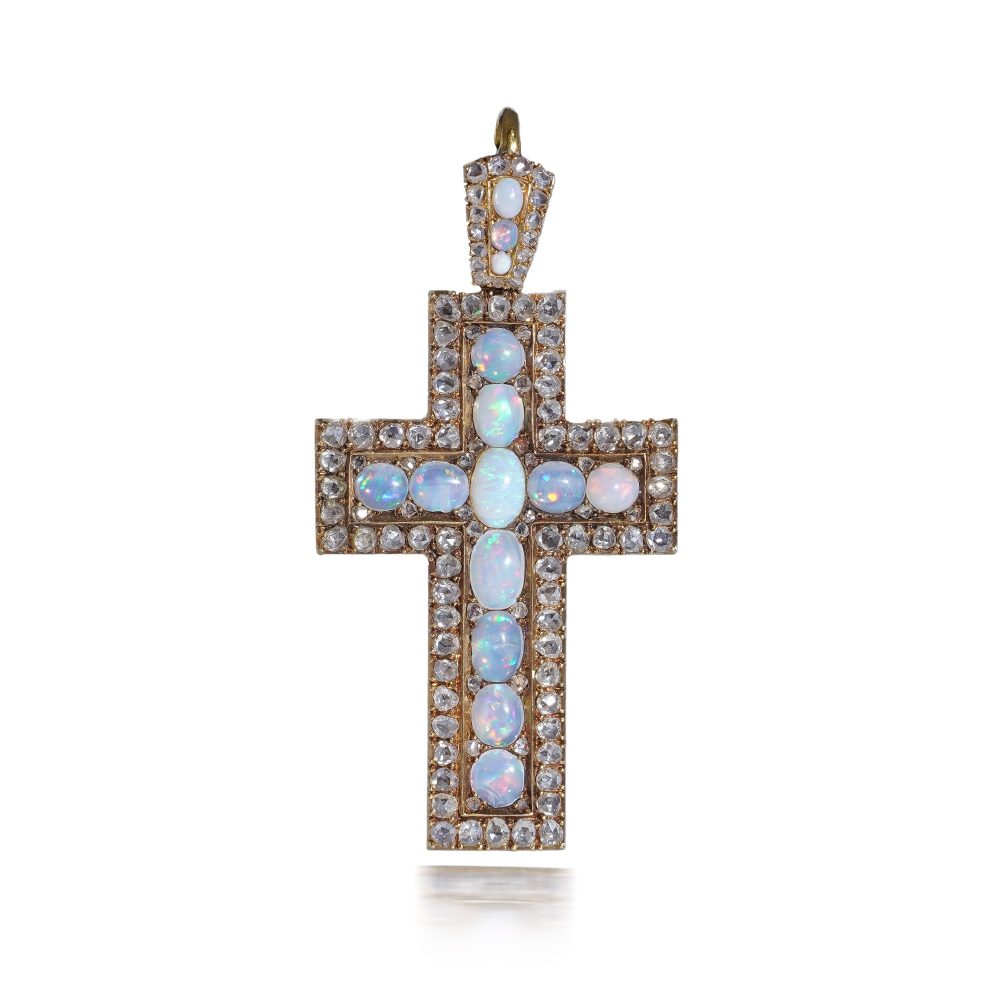 Antique 20 gold cross pendant set with diamonds and opals.