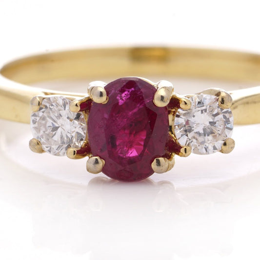 Ruby and diamond ring set in 18 ct gold