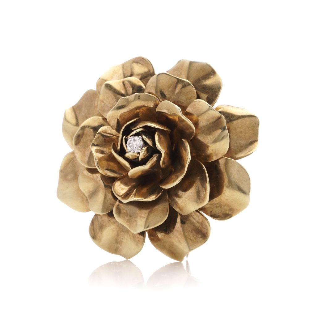 Boucheron vintage gold and diamond flower head brooch.