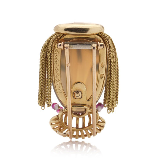 Gold brooch with chalcedony, turquoise, ruby and pearls.