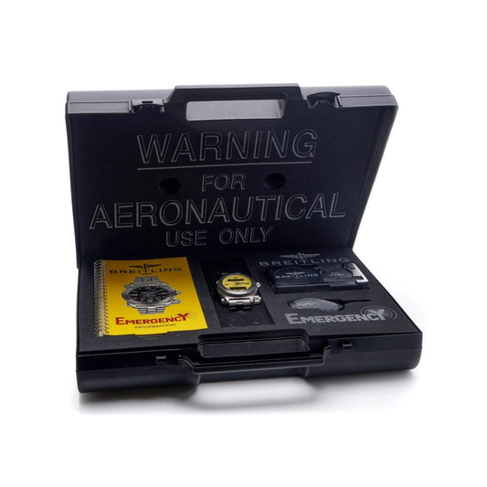 Breitling Emergency 43mm Titanium Quartz Watch Full Set with Box and Papers and service history from 1998. Titanium Case Yellow Dial Emergency Transmitter Original Breitling Briefcase marked "For Aeronautical Use Only." All Original Manuals and Documentation Emergency Information booklet Warranty User Manual
