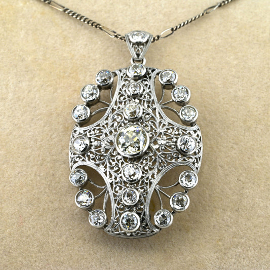 Edwardian Antique 8ct Old Mine Cut Diamond Pendant come Brooch in Platinum