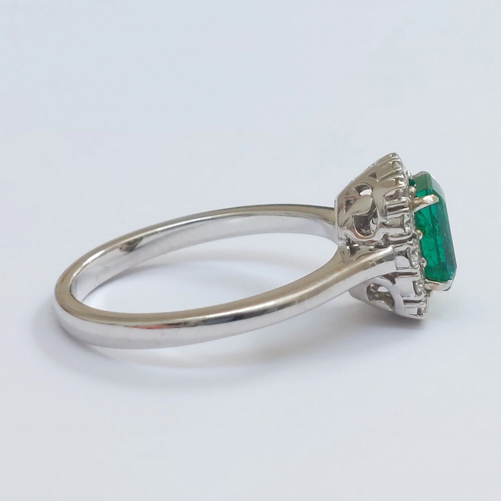 Emerald Cut Emerald and Diamond Cluster Ring in 18ct Gold, 1.13 carats