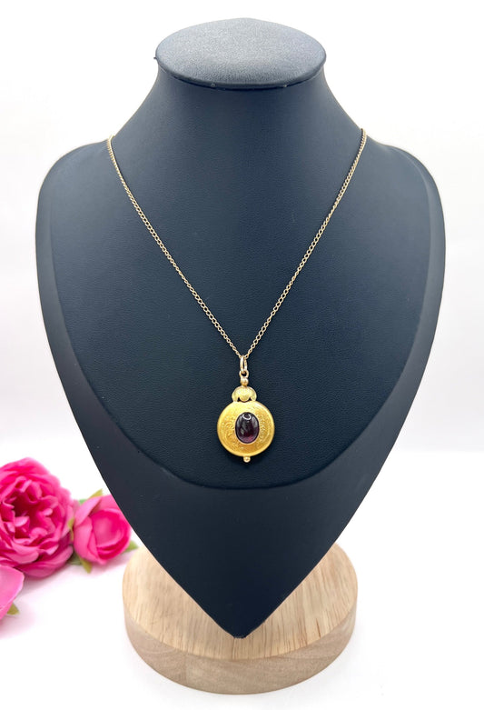 Victorian 15 Carat Two-Colour Gold Cabochon Garnet Locket Back Pendant, Circa 1870