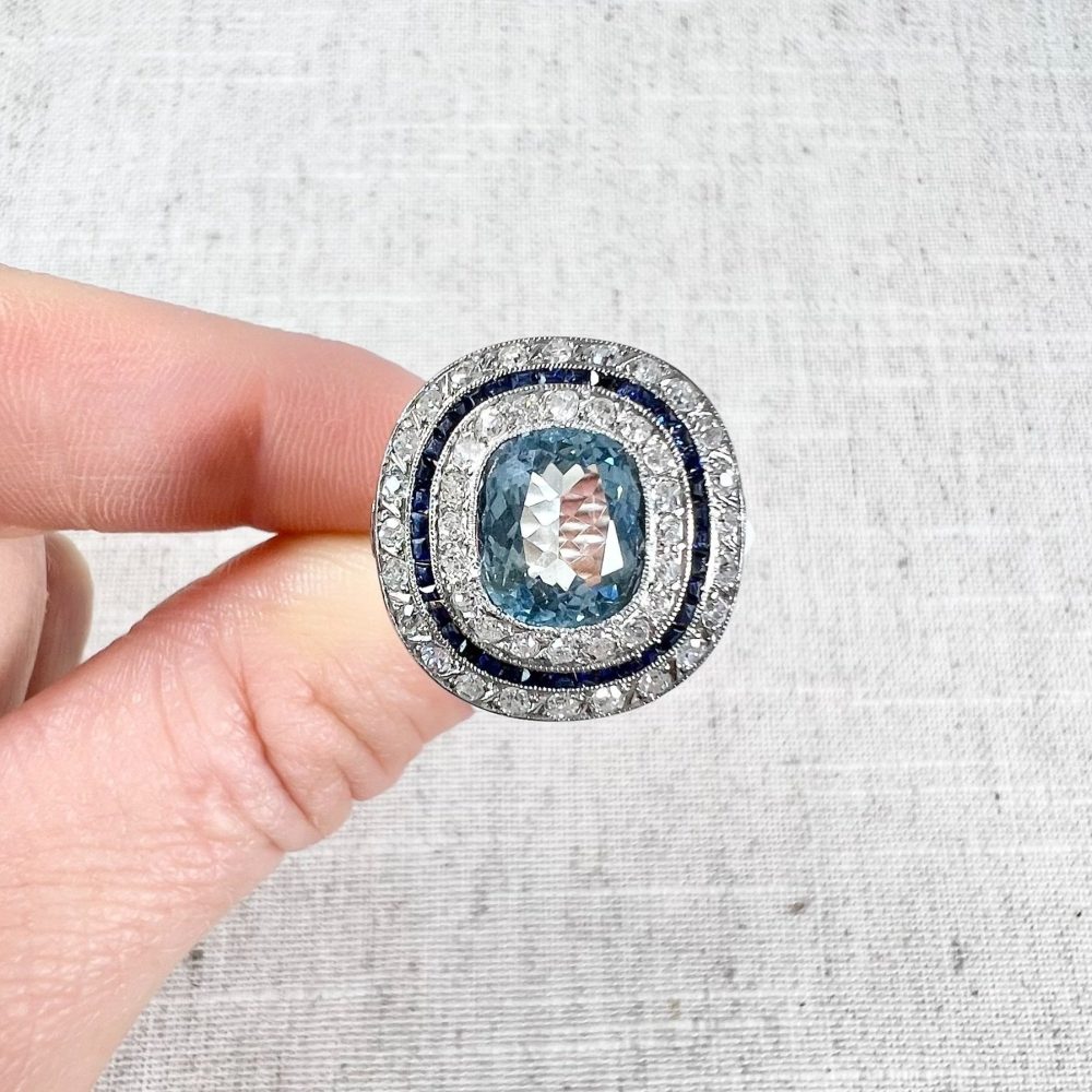 Edwardian Antique Cushion Cut Aquamarine Sapphire and Old Cut Diamond Double Halo Cluster Target Ring in platinum Circa 1910