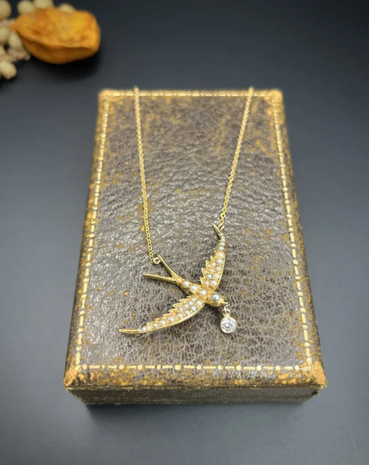 Antique 15 Carat Yellow Gold Swallow Pendant Necklace With Pearls And Diamond Drop