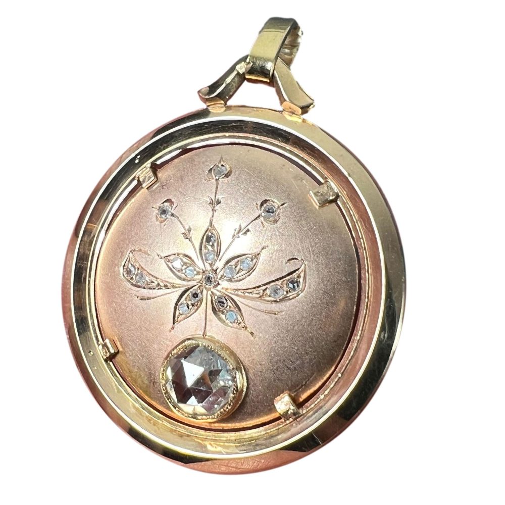 French floral charm pendant in rose gold with diamonds.