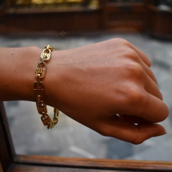 MAUBOUSSIN BI-COLOUR GOLD PADLOCK BRACELET CIRCA 1980 MO5