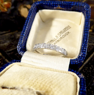 Modern 0.66ct Diamond Half Eternity Ring
