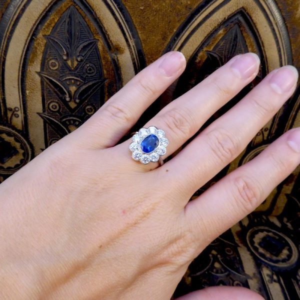 Oval Sapphire 1.70ct and Brilliant Cut Diamond Cluster Ring
