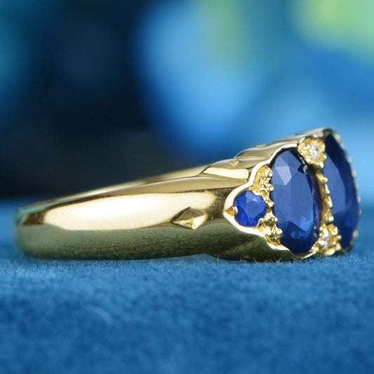 Antique Style Sapphire Three Stone Trilogy Ring in Yellow Gold