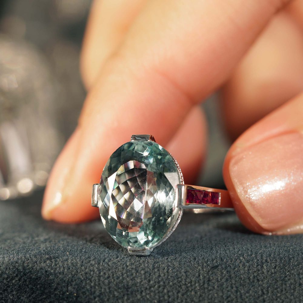 6.34ct Aquamarine Solitaire Ring with Ruby Shoulders