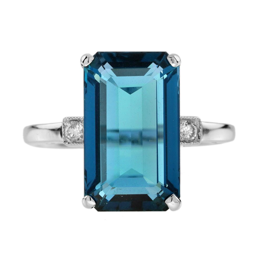 8.80ct Emerald Cut Blue Topaz Solitaire Engagement Ring, single stone deep greenish-blue London topaz with sparkling diamond to each side in 18ct white gold