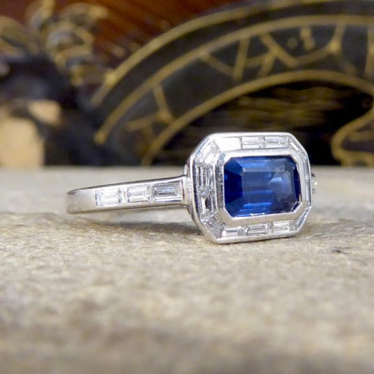 Emerald Cut Sapphire and Diamond Cluster Ring in Platinum