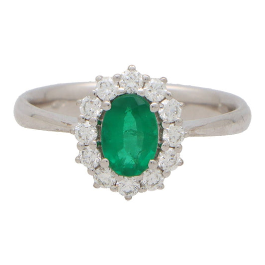 Contemporary 0.58ct Emerald and Diamond Cluster Ring