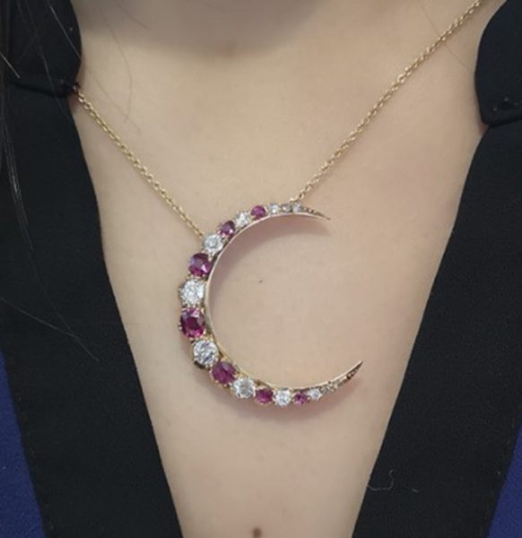 On model Antique Victorian Ruby Diamond and Gold Crescent Pendant, Circa 1880