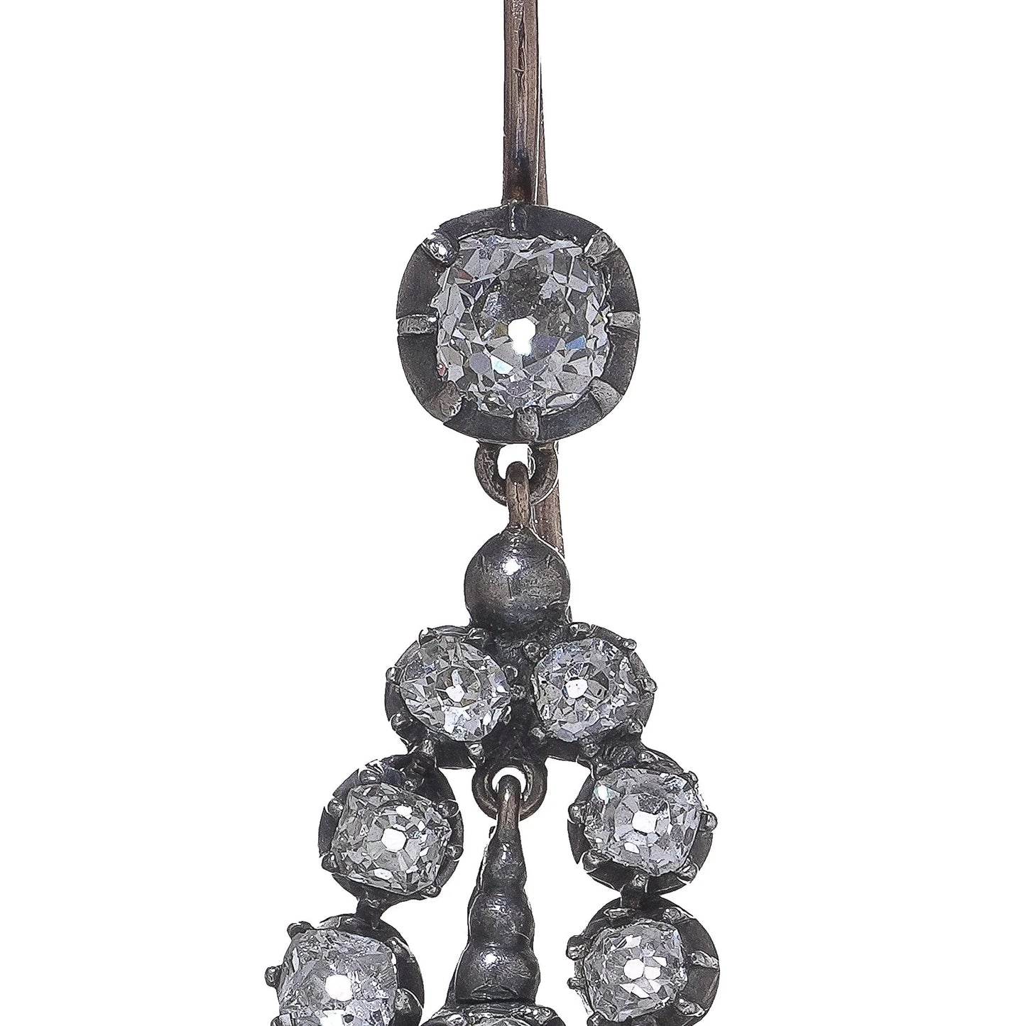 A pair of old cut diamond drop earrings in silver and gold, on a white background