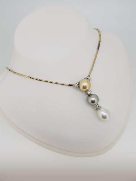 Tri Colour Pearl and Diamond Drop Pendant Necklace; featuring a golden, grey and white pearl suspended in a line accented with 1cts diamonds