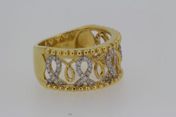 Diamond Set Openwork 18ct Yellow Gold Wide Band Ring; scrolled openwork design set with 0.36 carats of brilliant-cut diamonds