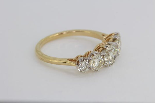 Old Cut Diamond Five Stone Ring; 2.00 carat total, featuring five graduated old-cut diamonds, claw set in white gold and mounted to a plain 18ct yellow gold shank