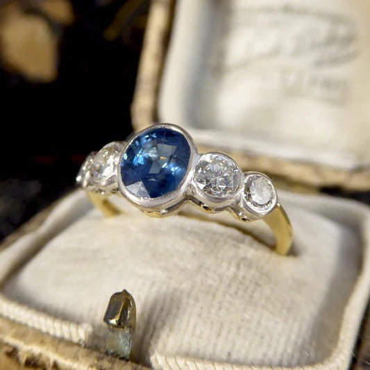 Edwardian sapphire and diamond five stone ring in white and yellow gold.