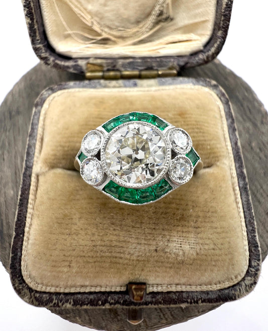 Platinum, Art Deco Style Calibrated Emerald & Diamond Ring