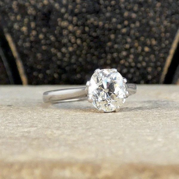 Old cut diamond engagement ring in white gold.