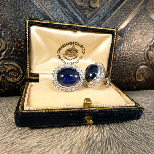 Sapphire and diamond stud earrings in white gold.