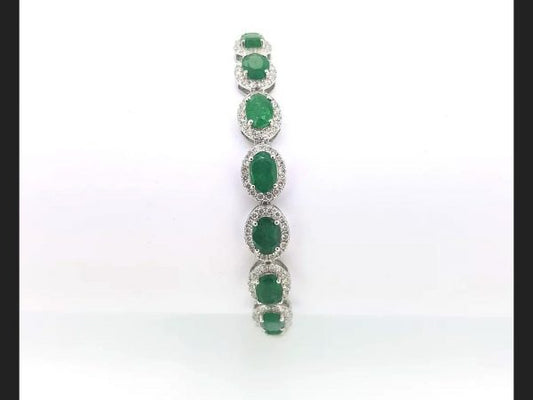 Emerald & Diamond flexible Bracelet 18ct white gold. (Emeralds 4.29ct, diamonds 1.48ct)