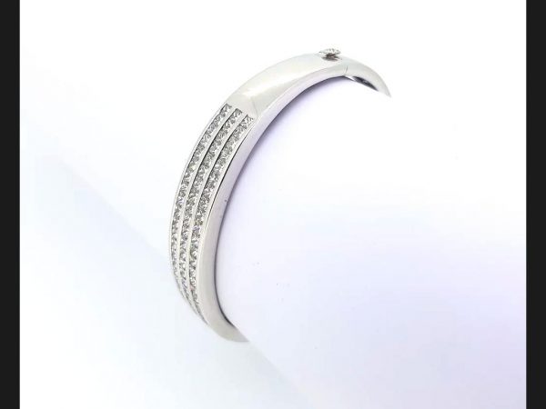 Princess cut diamond bangle, 18ct white gold. Diamond total weight: 4.80 carats