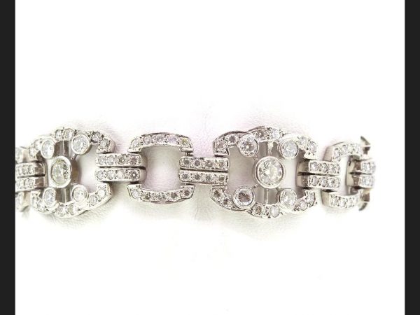 Art Deco style Diamond bracelet in the Art Deco style, Total Diamond weight 10.21 carats, Set in 18ct white gold
