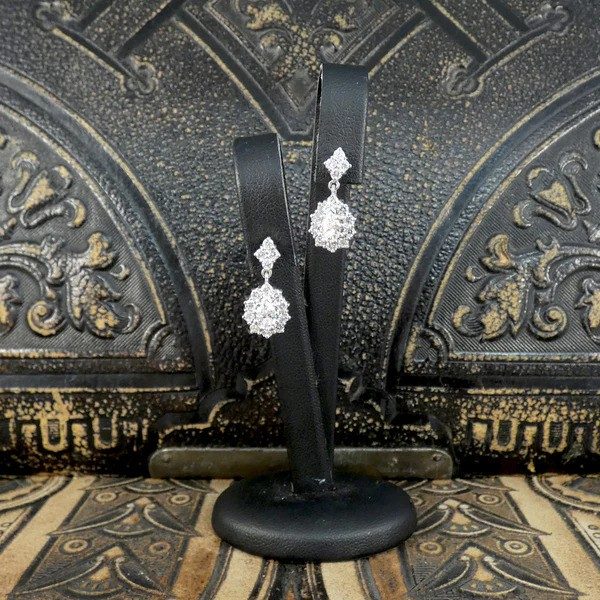 Diamond drop earrings in white gold.