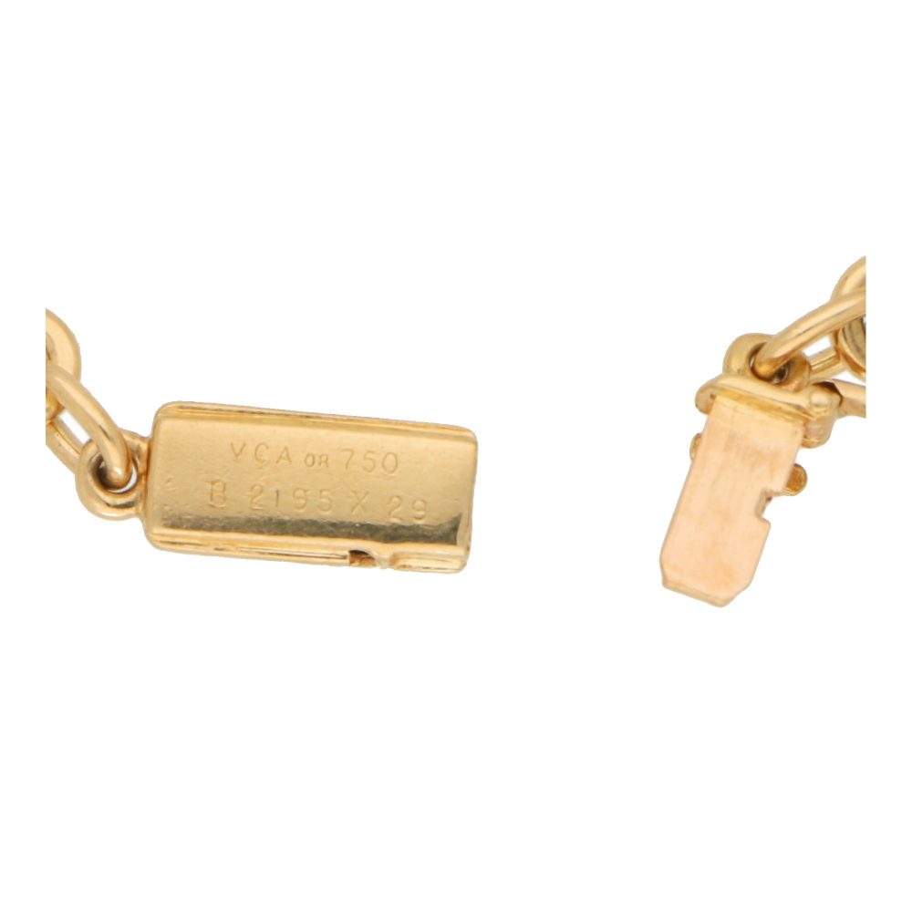 Van Cleef and Arpels onyx and diamond chain link bracelet in gold.